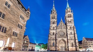 classic night view in Nuremberg on the illuminated building of the Church of St. Lorenz . Travel and sightseeing in Germany