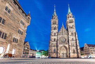 classic night view in Nuremberg on the illuminated building of the Church of St. Lorenz . Travel and sightseeing in Germany